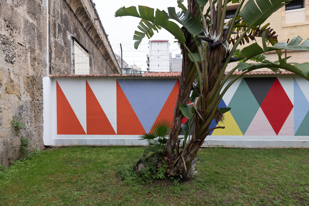 Paolo Gonzato, OUT OF STOCK, 2023, pittura al quarzo, 200x3000 cm, Palermo, Area Verde Casa di Reclusione Calogero Bona – Ucciardone.
